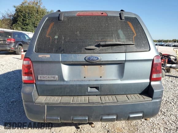 ✅ 2012 Ford Escape XLS • VIN: 1FMCU0C71CKC43475 • Lot: 87273615. Wystawiony na Copart z przebiegiem 241 017 mil. Bezpłatny archiwum sprzedaży aukcyjnych z USA i szczegółowy raport historii pojazdu na DreamBid. Zdjęcie 6.