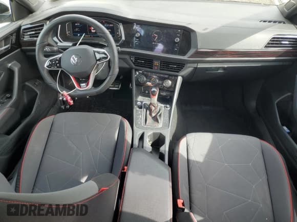 ✅ 2024 Volkswagen Jetta 40th Anniversary Edition • VIN: 3VW9T7BU7RM006621 • Лот: 58410695. Опубликован ранее на Copart с пробегом 16 412 миль. Бесплатный доступ к архиву аукционных продаж из США и подробный отчёт об истории автомобиля на DreamBid. Изображение 8.