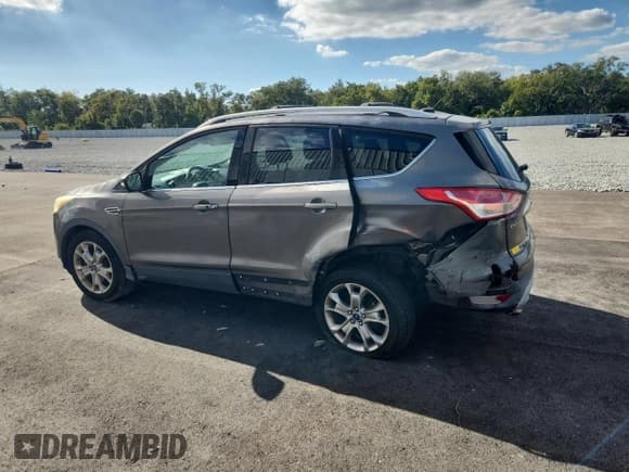 ✅ 2014 Ford Escape Titanium • VIN: 1FMCU0J99EUA85771 • Lot: 91504045. Listed on Copart with 131,245 mi. Free auction sales archive from the USA and detailed vehicle history report at DreamBid. Image 2.