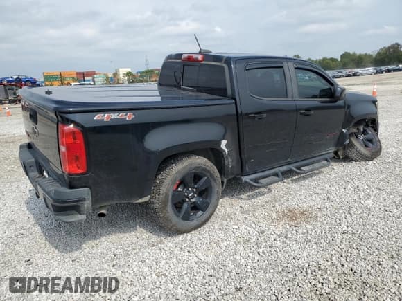 ✅ 2018 Chevrolet Colorado 4WD LT • VIN: 1GCGTCEN0J1148558 • Лот: 81397345. Опубликован ранее на Copart с пробегом 118 071 миль. Бесплатный доступ к архиву аукционных продаж из США и подробный отчёт об истории автомобиля на DreamBid. Изображение 3.