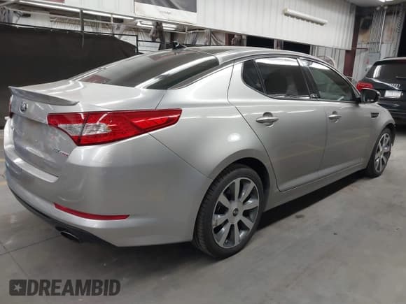 ✅ 2013 Kia Optima SX • VIN: 5XXGR4A6XDG106748 • Lot: 43325773. Listed on IAAI with 67,913 mi. Free auction sales archive from the USA and detailed vehicle history report at DreamBid. Image 4.