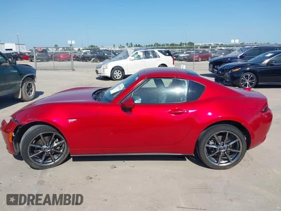 ✅ 2017 Mazda MX-5 Miata Grand Touring • VIN: JM1NDAM72H0104850 • Lot: 41995874. Listed on IAAI with 23,891 mi. Free auction sales archive from the USA and detailed vehicle history report at DreamBid. Image 14.