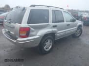 ✅ 2004 Jeep Grand Cherokee Laredo • VIN: 1J8GW48N04C136131 • Lot: 43765469. Listed on IAAI with 139,461 mi. Free auction sales archive from the USA and detailed vehicle history report at DreamBid. Image 4.