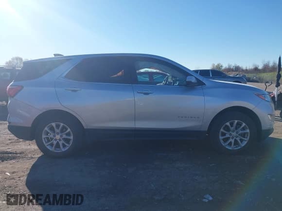 ✅ 2021 Chevrolet Equinox LT • VIN: 3GNAXUEV3MS114804 • Lot: 43555077. Listed on IAAI with 58,313 mi. Free auction sales archive from the USA and detailed vehicle history report at DreamBid. Image 14.