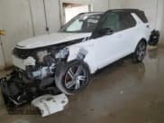 ✅ 2023 Land Rover Discovery HSE R-Dynamic • VIN: SALRM4EUXP2475290 • Лот: 68302224. Опубликован ранее на Copart с пробегом 12 512 миль. Бесплатный доступ к архиву аукционных продаж из США и подробный отчёт об истории автомобиля на DreamBid. Изображение 1.