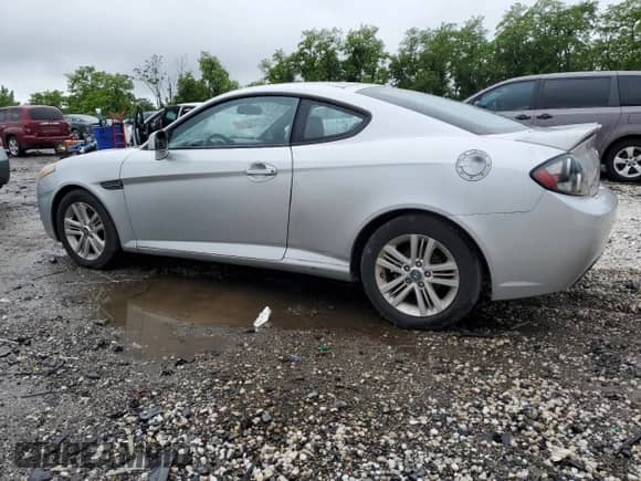 2008 Hyundai Tiburon GS с VIN KMHHM66D68U288062, выставлен на аукционе Copart как лот 58261695 с пробегом 130 310 миль миль и Чистый • Clean title. История ставок и продаж доступна на DreamBid. Изображение 2.