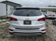 ✅ 2017 Hyundai Santa Fe 2.4L • VIN: 5XYZUDLBXHG498231 • Лот: 56069564. Опубликован ранее на Copart с пробегом Не указан. Бесплатный доступ к архиву аукционных продаж из США и подробный отчёт об истории автомобиля на DreamBid. Изображение 6.