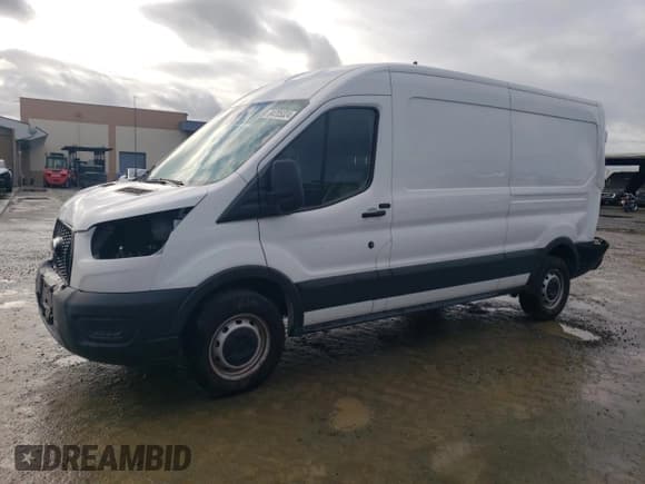 ✅ 2021 Ford Transit Cargo • VIN: 1FTBR1CG7MKA88875 • Lot: 84705324. Listed on Copart with 23,654 mi. Free auction sales archive from the USA and detailed vehicle history report at DreamBid. Image 1.