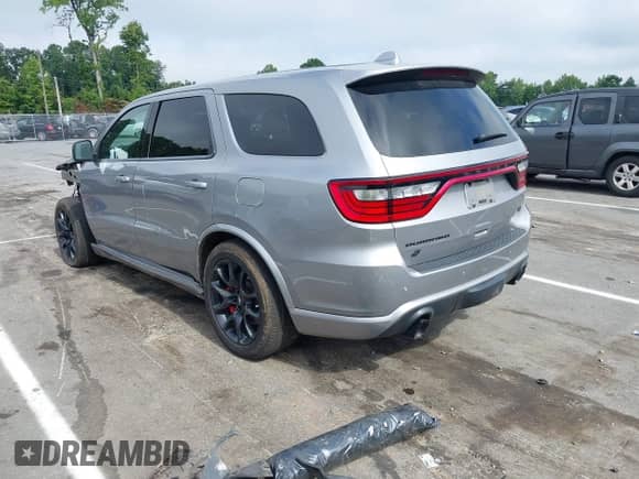 2021 Dodge Durango R/T with VIN 1C4SDJCT6MC879260, listed as a IAAI auction lot 42709837 with 59,646 mi miles and . Bid and sale history available at DreamBid. Image 3.