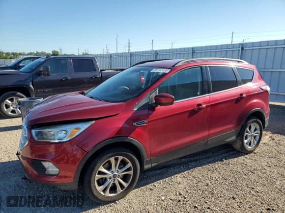 ✅ 2018 Ford Escape SE • VIN: 1FMCU9GD8JUD16329 • Lot: 69762495. Wystawiony na Copart z przebiegiem 152 119 mil. Bezpłatny archiwum sprzedaży aukcyjnych z USA i szczegółowy raport historii pojazdu na DreamBid. Zdjęcie 1.