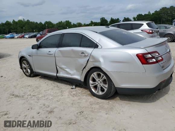 ✅ 2016 Ford Taurus SEL • VIN: 1FAHP2E82GG140096 • Lot: 54833135. Listed on Copart with 69,639 mi. Free auction sales archive from the USA and detailed vehicle history report at DreamBid. Image 2.