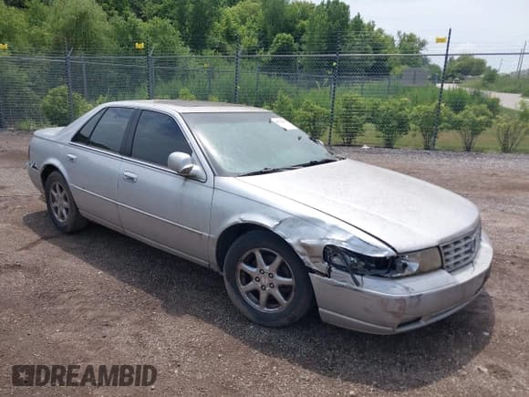 ✅ 1999 Cadillac Seville STS • VIN: 1G6KY5494XU941450 • Lot: 42722946. Listed on IAAI with 202,231 mi. Free auction sales archive from the USA and detailed vehicle history report at DreamBid. Image 1.