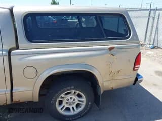 ✅ 2004 Dodge Dakota SLT • VIN: 1D7HL48N04S653798 • Lot: 42520546. Wystawiony na IAAI z przebiegiem 115 259 mil. Bezpłatny archiwum sprzedaży aukcyjnych z USA i szczegółowy raport historii pojazdu na DreamBid. Zdjęcie 6.