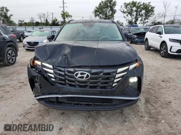 ✅ 2022 Hyundai Tucson SEL • VIN: 5NMJF3AE3NH089858 • Lot: 71207864. Wystawiony na Copart z przebiegiem 20 723 mil. Bezpłatny archiwum sprzedaży aukcyjnych z USA i szczegółowy raport historii pojazdu na DreamBid. Zdjęcie 5.