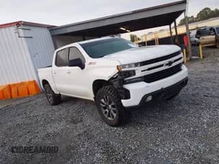 2020 Chevrolet Silverado 1500 RST with VIN 3GCUYEET9LG110801, listed as a IAAI auction lot 43146146 with 145,879 mi miles and . Bid and sale history available at DreamBid. Image 1.