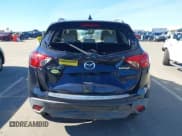 ✅ 2016 Mazda CX-5 Grand Touring • VIN: JM3KE2DY5G0715623 • Lot: 43582561. Wystawiony na IAAI z przebiegiem 166 935 mil. Bezpłatny archiwum sprzedaży aukcyjnych z USA i szczegółowy raport historii pojazdu na DreamBid. Zdjęcie 16.
