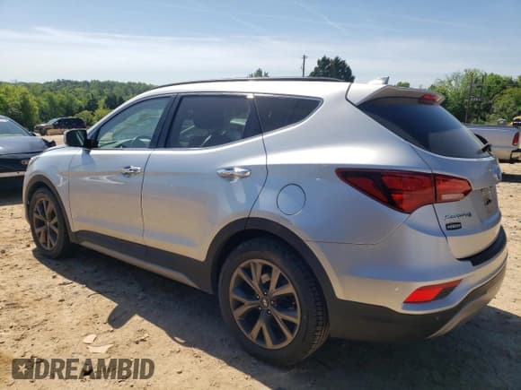 ✅ 2017 Hyundai Santa Fe Ultimate • VIN: 5XYZW4LA4HG482088 • Лот: 52152604. Опубликован ранее на Copart с пробегом 106 923 миль. Бесплатный доступ к архиву аукционных продаж из США и подробный отчёт об истории автомобиля на DreamBid. Изображение 2.