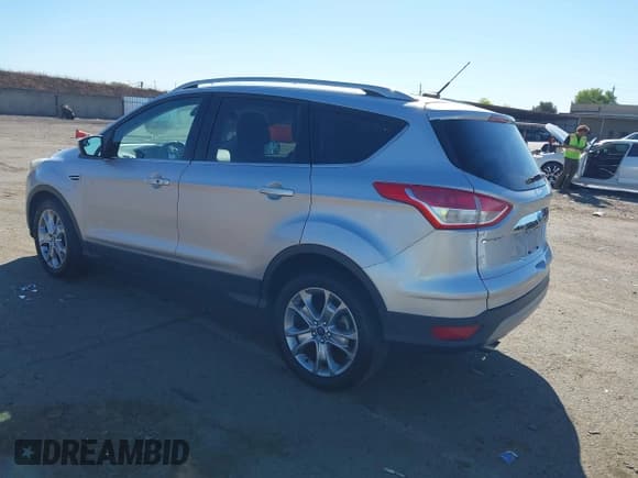 ✅ 2016 Ford Escape Titanium • VIN: 1FMCU0JX0GUC80790 • Lot: 43407176. Listed on IAAI with 103,681 mi. Free auction sales archive from the USA and detailed vehicle history report at DreamBid. Image 3.