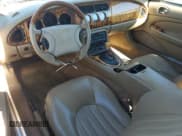 ✅ 1997 Jaguar XK • VIN: SAJGX2745VC002204 • Лот: 82601765. Опубликован ранее на Copart с пробегом 96 265 миль. Бесплатный доступ к архиву аукционных продаж из США и подробный отчёт об истории автомобиля на DreamBid. Изображение 8.