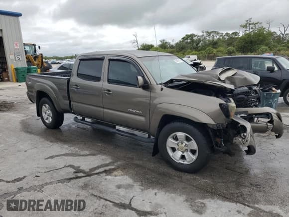 ✅ 2011 Toyota Tacoma PreRunner • VIN: 5TFKU4HN9BX001422 • Лот: 59499145. Опубликован ранее на Copart с пробегом 207 988 миль. Бесплатный доступ к архиву аукционных продаж из США и подробный отчёт об истории автомобиля на DreamBid. Изображение 4.