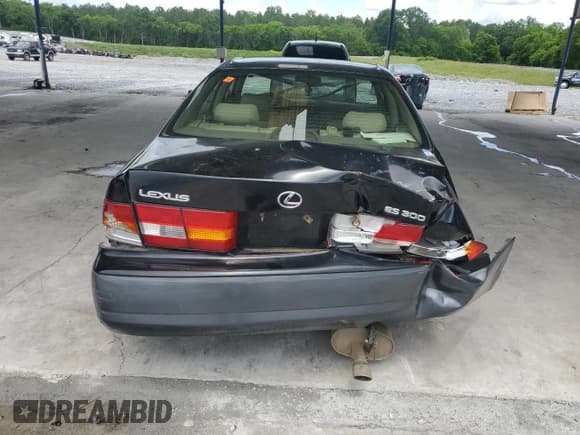 ✅ 1998 Lexus ES 300 • VIN: JT8BF28G7W5048920 • Lot: 56391015. Listed on Copart with 234,109 mi. Free auction sales archive from the USA and detailed vehicle history report at DreamBid. Image 6.
