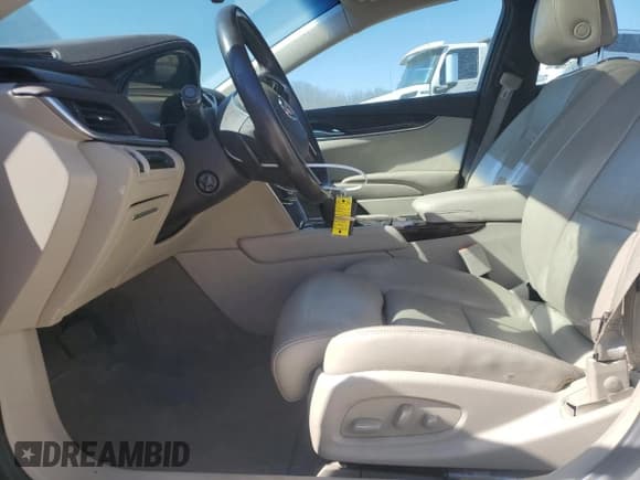 ✅ 2013 Cadillac XTS Premium • VIN: 2G61S5S39D9151405 • Lot: 47355965. Wystawiony na Copart z przebiegiem 150 288 mil. Bezpłatny archiwum sprzedaży aukcyjnych z USA i szczegółowy raport historii pojazdu na DreamBid. Zdjęcie 7.