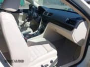 ✅ 2015 Volkswagen Passat SEL Premium • VIN: 1VWCT7A31FC072643 • Лот: 42104061. Опубликован ранее на IAAI с пробегом 117 277 миль. Бесплатный доступ к архиву аукционных продаж из США и подробный отчёт об истории автомобиля на DreamBid. Изображение 5.