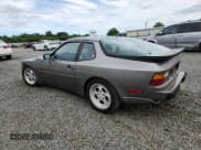 ✅ 1986 Porsche 944 • VIN: WP0AA0952GN154237 • Lot: 64994695. Wystawiony na Copart z przebiegiem 104 002 mil. Bezpłatny archiwum sprzedaży aukcyjnych z USA i szczegółowy raport historii pojazdu na DreamBid. Zdjęcie 2.