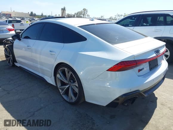 ✅ 2021 Audi RS 7 • VIN: WUAPCBF24MN900891 • Лот: 42260367. Опубликован ранее на IAAI с пробегом 54 327 миль. Бесплатный доступ к архиву аукционных продаж из США и подробный отчёт об истории автомобиля на DreamBid. Изображение 3.