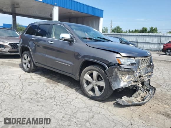 ✅ 2014 Jeep Grand Cherokee Overland • VIN: 1C4RJFCG8EC220363 • Lot: 66796665. Listed on Copart with 122,401 mi. Free auction sales archive from the USA and detailed vehicle history report at DreamBid. Image 4.