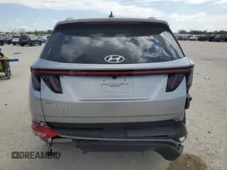 ✅ 2022 Hyundai Tucson SEL • VIN: 5NMJF3AE5NH061415 • Lot: 71458954. Wystawiony na Copart z przebiegiem 31 585 mil. Bezpłatny archiwum sprzedaży aukcyjnych z USA i szczegółowy raport historii pojazdu na DreamBid. Zdjęcie 6.