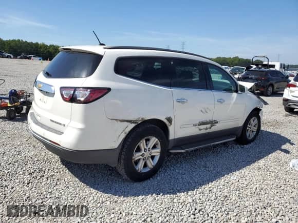 2014 Chevrolet Traverse LT с VIN 1GNKRGKD7EJ105750, выставлен на аукционе Copart как лот 70741045 с пробегом 138 651 миль миль и Списание • Salvage title. История ставок и продаж доступна на DreamBid. Изображение 3.