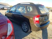 ✅ 2009 Kia Rondo LX • VIN: KNAFG528497258321 • Lot: 43543018. Listed on IAAI with 138,070 mi. Free auction sales archive from the USA and detailed vehicle history report at DreamBid. Image 3.