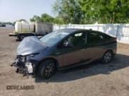 ✅ 2022 Toyota Prius LE • VIN: JTDKAMFP1N3223218 • Lot: 58561985. Listed on Copart with 98,017 mi. Free auction sales archive from the USA and detailed vehicle history report at DreamBid. Image 1.