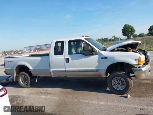 ✅ 1999 Ford F-250 XL • VIN: 1FTNX21F8XEA74702 • Lot: 43097148. Wystawiony na IAAI z przebiegiem 144 963 mil. Bezpłatny archiwum sprzedaży aukcyjnych z USA i szczegółowy raport historii pojazdu na DreamBid. Zdjęcie 14.