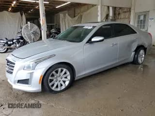 ✅ 2015 Cadillac CTS Luxury AWD • VIN: 1G6AX5SXXF0110976 • Лот: 85079875. Опубликован ранее на Copart с пробегом 102 208 миль. Бесплатный доступ к архиву аукционных продаж из США и подробный отчёт об истории автомобиля на DreamBid. Изображение 1.