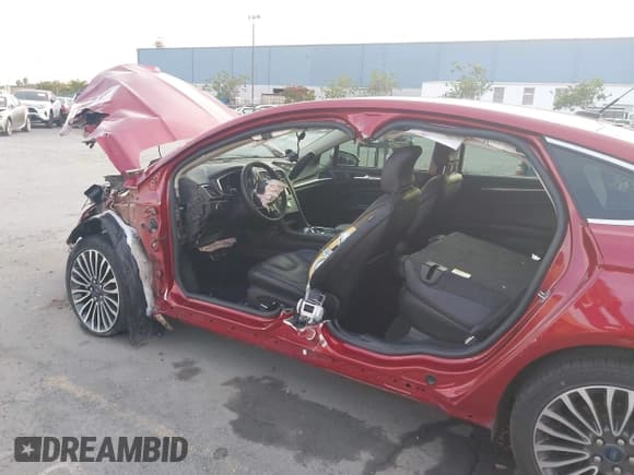 ✅ 2017 Ford Fusion Hybrid Titanium • VIN: 3FA6P0RU8HR277590 • Lot: 43668115. Listed on IAAI with Not provided. Free auction sales archive from the USA and detailed vehicle history report at DreamBid. Image 6.