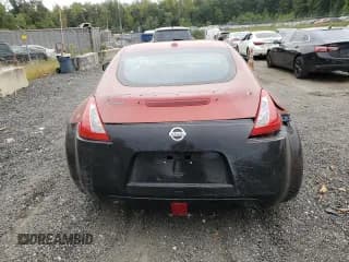 ✅ 2013 Nissan 370Z • VIN: JN1AZ4EH9DM880245 • Лот: 57434514. Опубликован ранее на Copart с пробегом 96 001 миль. Бесплатный доступ к архиву аукционных продаж из США и подробный отчёт об истории автомобиля на DreamBid. Изображение 6.