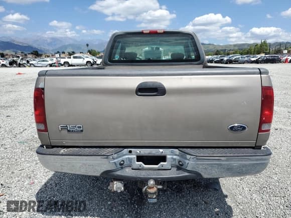 ✅ 2001 Ford F-150 • VIN: 1FTPX17L21NA37619 • Lot: 56922485. Wystawiony na Copart z przebiegiem 212 148 mil. Bezpłatny archiwum sprzedaży aukcyjnych z USA i szczegółowy raport historii pojazdu na DreamBid. Zdjęcie 6.