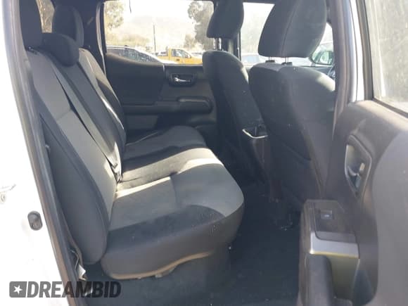 ✅ 2023 Toyota Tacoma SR • VIN: 3TMCZ5AN5PM568102 • Лот: 43038472. Опубликован ранее на IAAI с пробегом 50 673 миль. Бесплатный доступ к архиву аукционных продаж из США и подробный отчёт об истории автомобиля на DreamBid. Изображение 8.