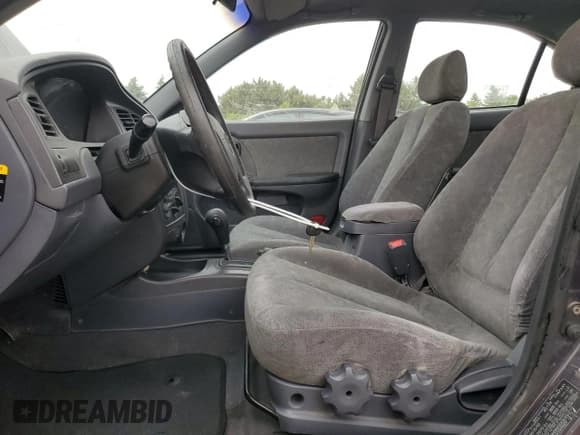 ✅ 2003 Hyundai Elantra GLS • VIN: KMHDN45D63U594320 • Lot: 58742565. Wystawiony na Copart z przebiegiem 163 772 mil. Bezpłatny archiwum sprzedaży aukcyjnych z USA i szczegółowy raport historii pojazdu na DreamBid. Zdjęcie 7.