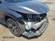 ✅ 2021 Lexus RX 450h • VIN: 2T2HGMDA6MC065516 • Лот: 42162407. Опубликован ранее на IAAI с пробегом 81 501 миль. Бесплатный доступ к архиву аукционных продаж из США и подробный отчёт об истории автомобиля на DreamBid. Изображение 18.