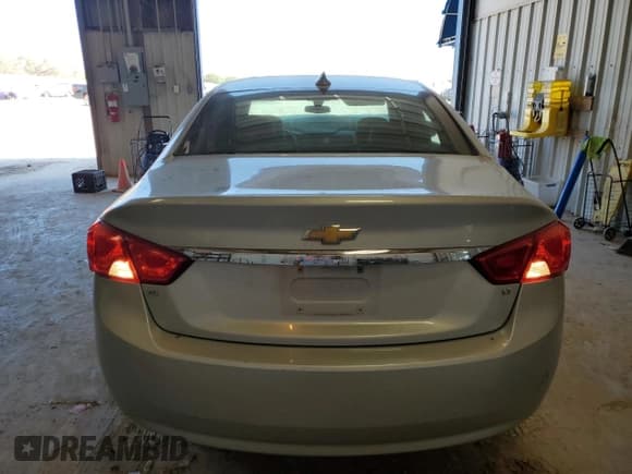 ✅ 2017 Chevrolet Impala LT • VIN: 2G1105S32H9113208 • Лот: 71550734. Опубликован ранее на Copart с пробегом 124 740 миль. Бесплатный доступ к архиву аукционных продаж из США и подробный отчёт об истории автомобиля на DreamBid. Изображение 6.