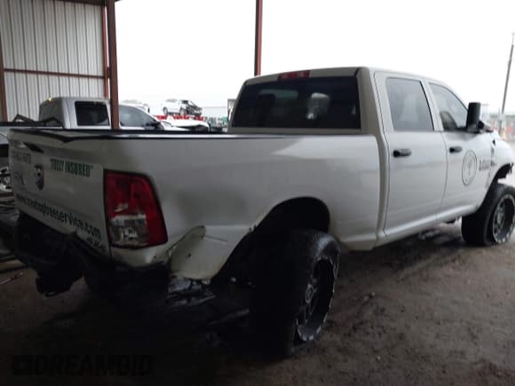 ✅ 2018 Ram 2500 Tradesman • VIN: 3C6UR5CL2JG283449 • Lot: 42113371. Listed on IAAI with 127,352 mi. Free auction sales archive from the USA and detailed vehicle history report at DreamBid. Image 4.