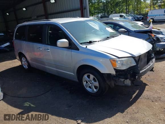 2012 Dodge Grand Caravan SXT z VIN 2C4RDGCG9CR357748, wystawiony jako IAAI lot #43318031 z przebiegiem 79 308 mil mil oraz . Historia ofert i sprzedaży dostępna na DreamBid. Obrazek 1.