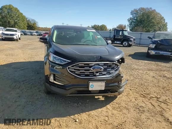 ✅ 2022 Ford Edge Titanium • VIN: 2FMPK4K93NBA54812 • Lot: 90880715. Wystawiony na Copart z przebiegiem 97 062 mil. Bezpłatny archiwum sprzedaży aukcyjnych z USA i szczegółowy raport historii pojazdu na DreamBid. Zdjęcie 14.