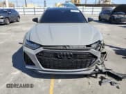 ✅ 2021 Audi RS 6 • VIN: WUA1CBF21MN908467 • Лот: 57352125. Опубликован ранее на Copart с пробегом 24 727 миль. Бесплатный доступ к архиву аукционных продаж из США и подробный отчёт об истории автомобиля на DreamBid. Изображение 5.