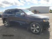 ✅ 2014 Jeep Grand Cherokee Overland • VIN: 1C4RJFCT0EC265195 • Lot: 82276605. Listed on Copart with 150,821 mi. Free auction sales archive from the USA and detailed vehicle history report at DreamBid. Image 4.