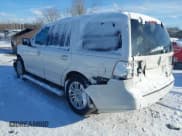 ✅ 2014 Lincoln Navigator • VIN: 5LMJJ2J5XEEL08268 • Lot: 41588145. Listed on IAAI with 116,938 mi. Free auction sales archive from the USA and detailed vehicle history report at DreamBid. Image 3.