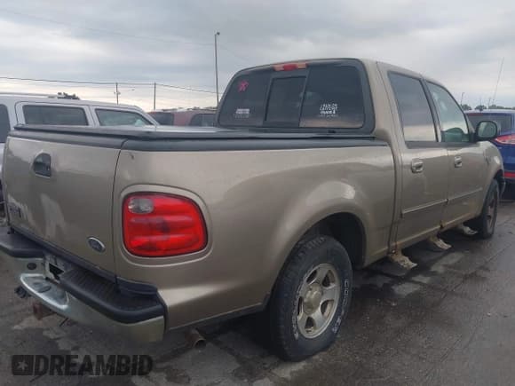 ✅ 2003 Ford F-150 XLT • VIN: 1FTRW07693KC89081 • Lot: 43020148. Wystawiony na IAAI z przebiegiem 215 580 mil. Bezpłatny archiwum sprzedaży aukcyjnych z USA i szczegółowy raport historii pojazdu na DreamBid. Zdjęcie 4.